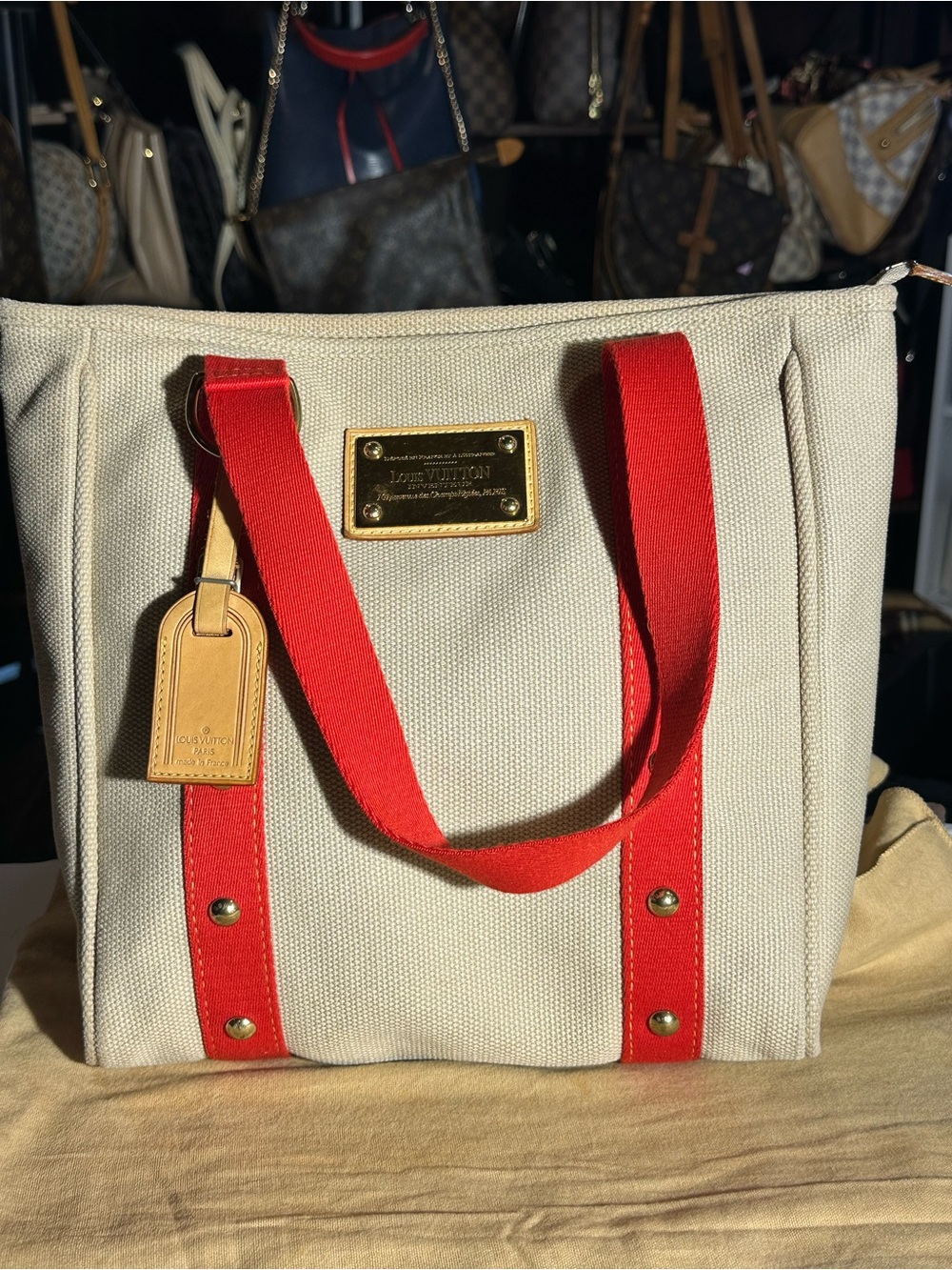 Louis Vuitton Cream Canvas Tote with Red Straps and Gold Plaque